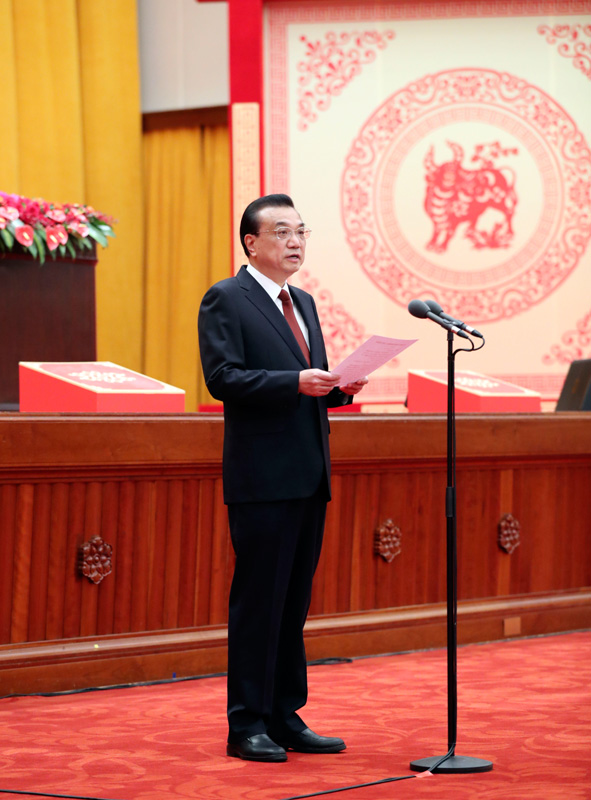 中共中央国务院春节团拜会，共庆佳节，凝聚力量